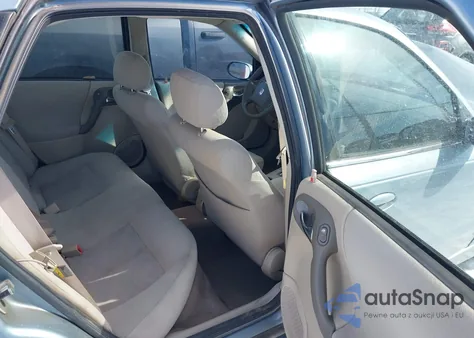 2003 Saturn L-Series L200 из США, поврежденный, VIN 1G8JU54F13Y574501